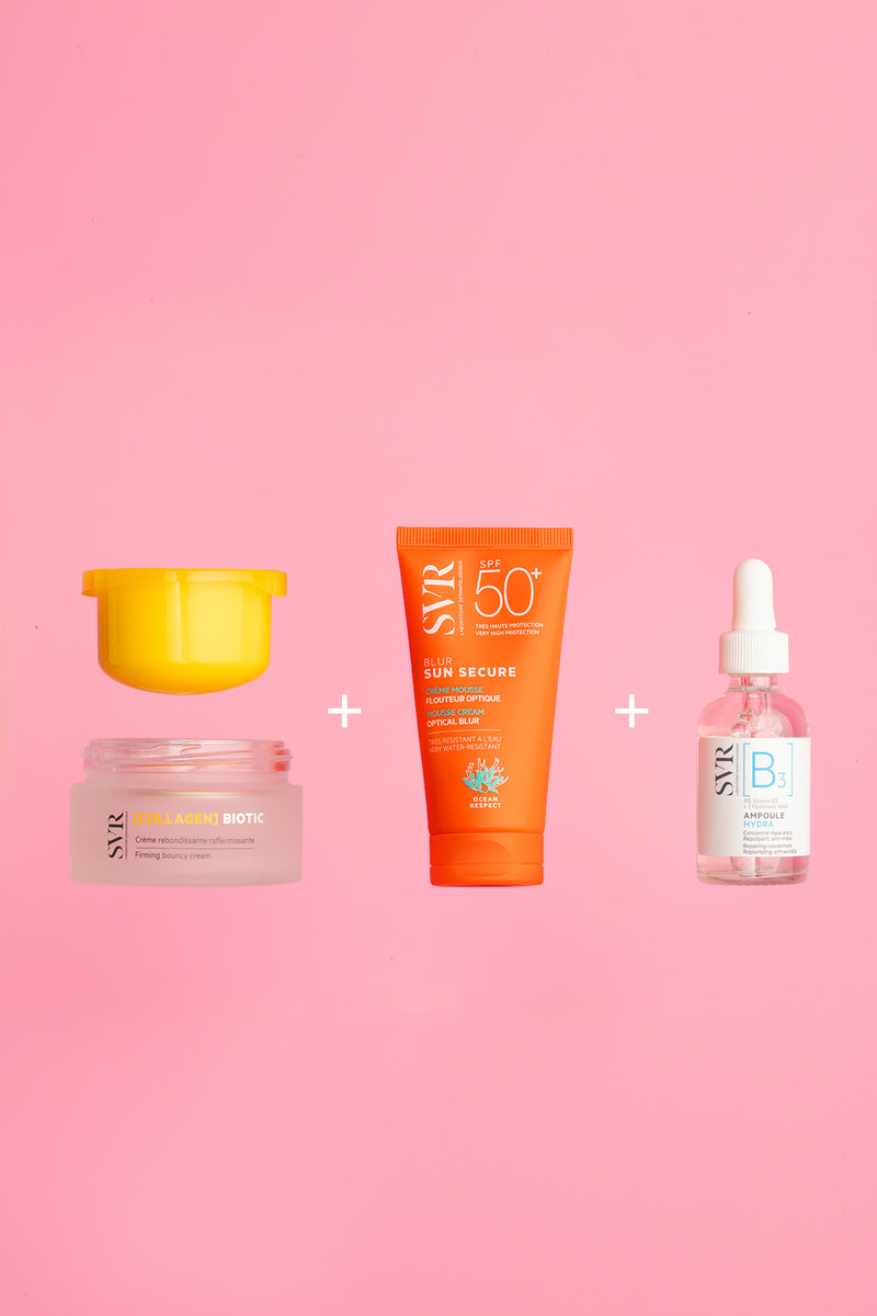 SVR skincare routine featuring a firming cream jar, orange SPF 50 sunscreen tube, and B3 hydra serum on a pink background.