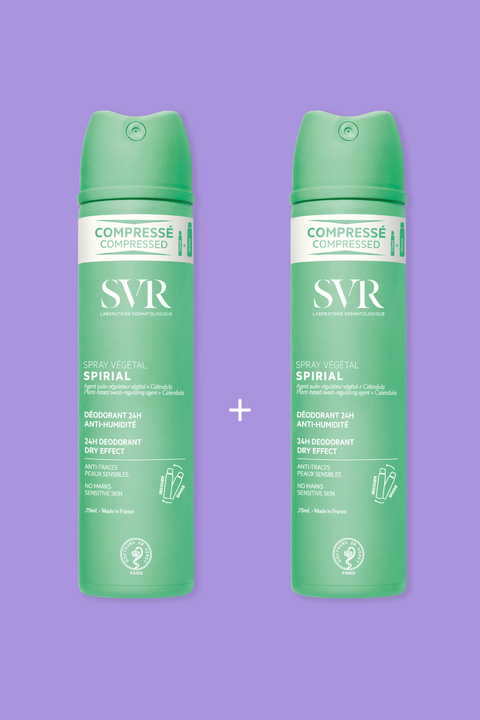 Two green SVR Spirial compressed deodorant spray cans against a purple background.
